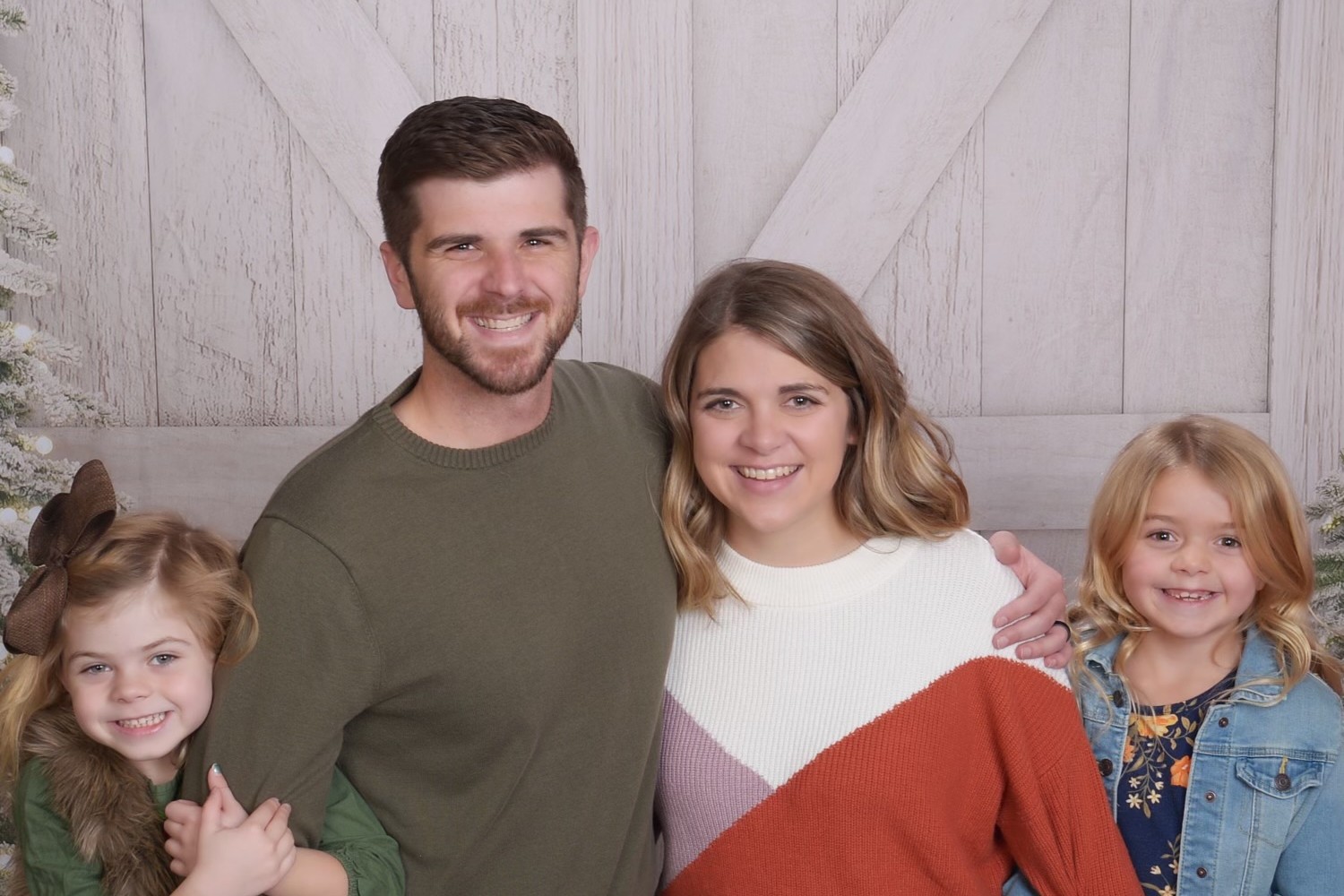 Travis Potter with Andrea and their two daughters